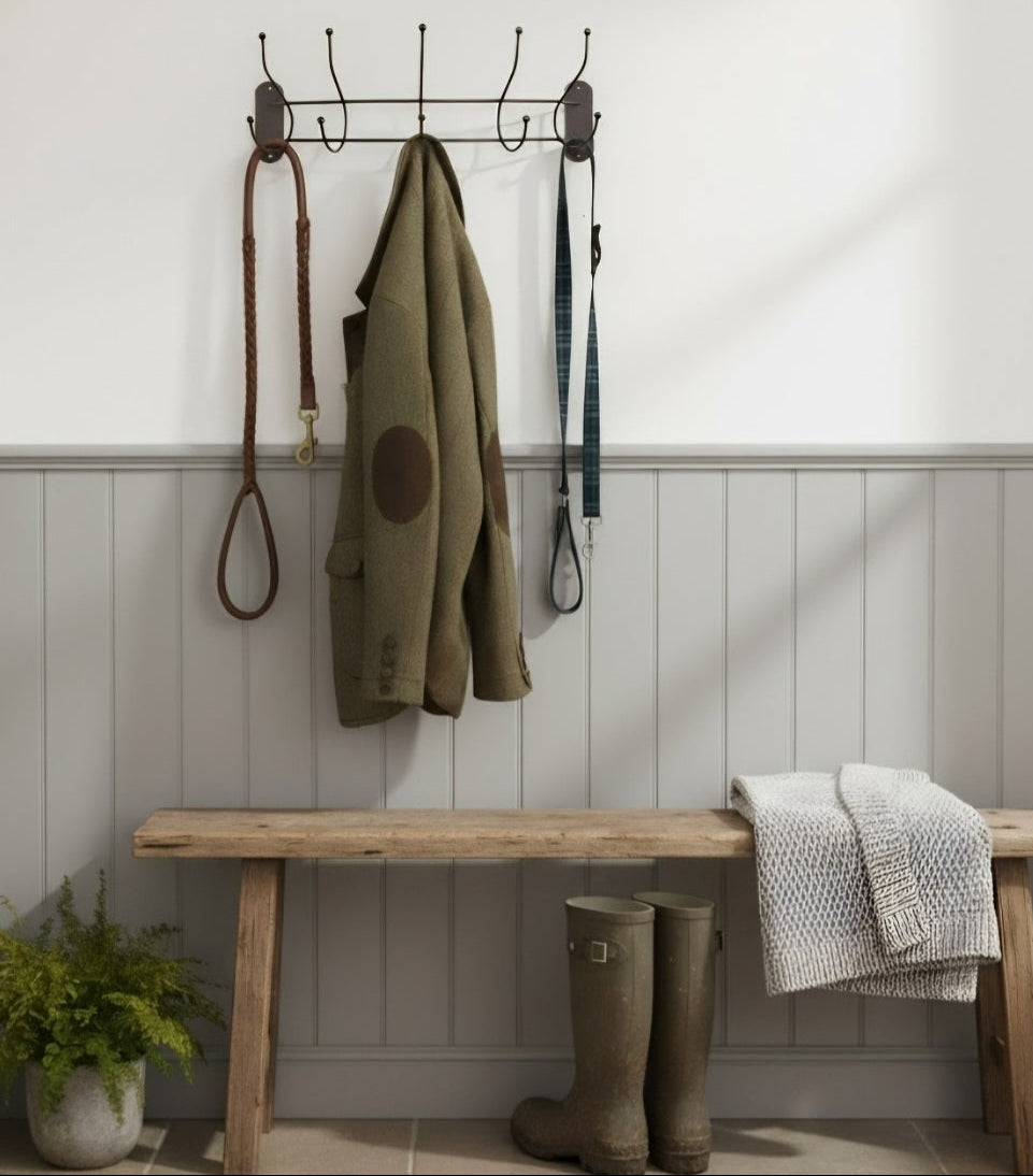 Antique dark bronze curved coat hanger rail for hallway