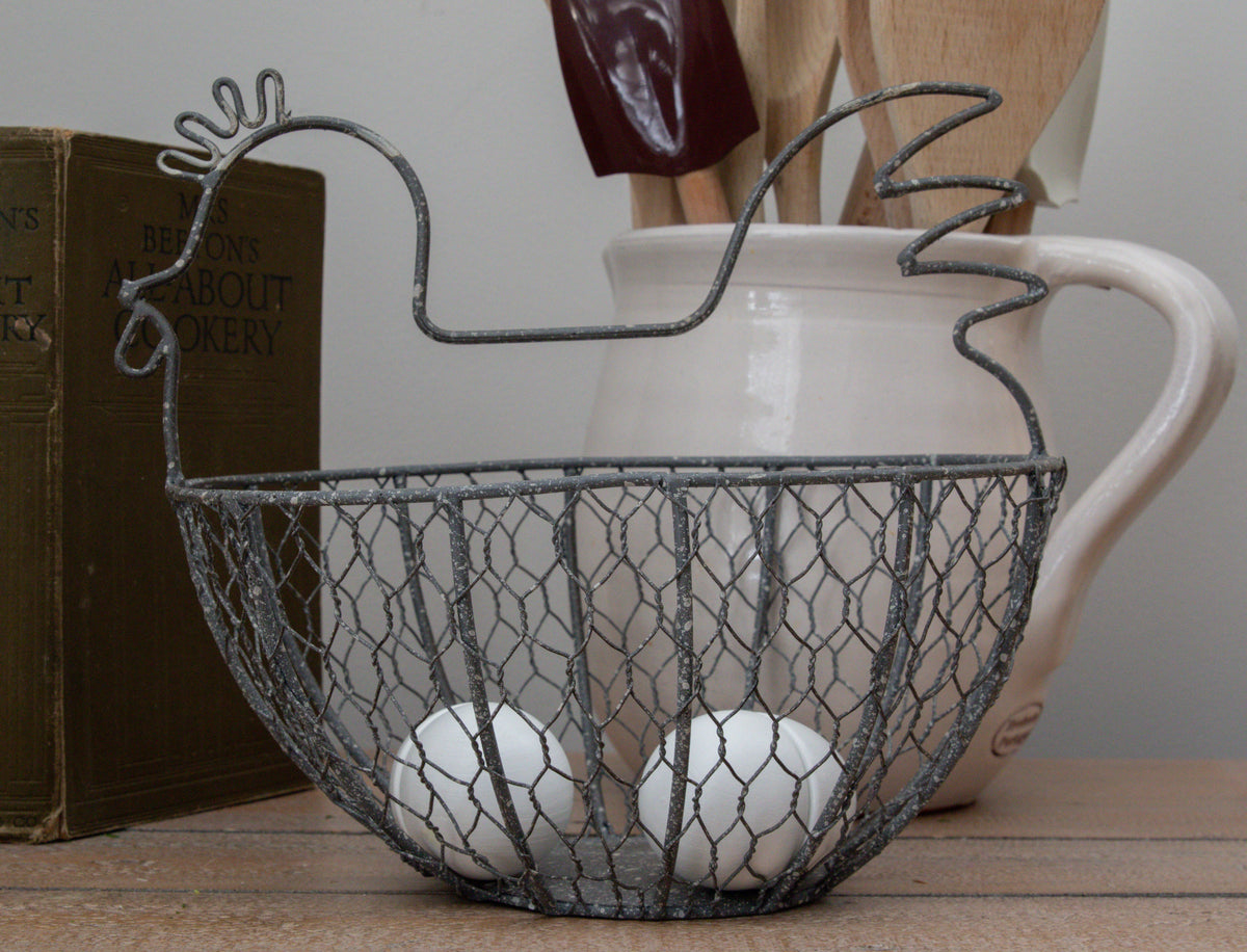 Rustic wire chicken egg basket for kitchen display
