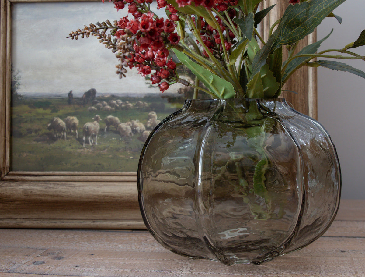 Green hammered glass vase for floral arrangements