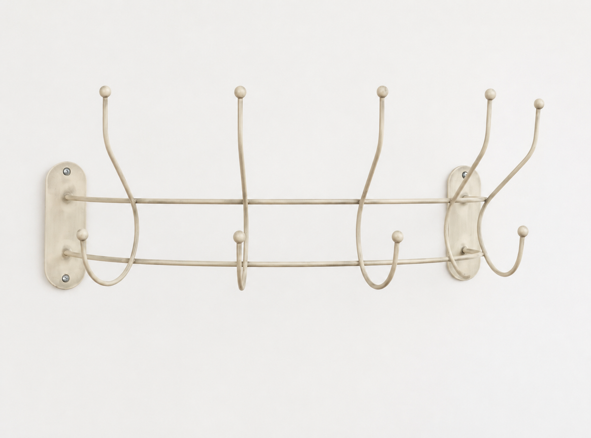 Ivory curved wall-mounted coat hanger rail