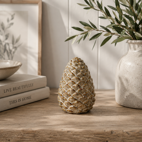 Beige mottled ceramic pinecone decoration for seasonal display