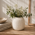 Small cream ceramic ribbed vase for home styling